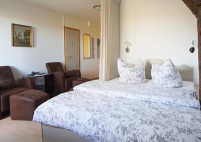 Bett in der Ferienwohnung F18 Haubarg & Remise St. Peter-Ording