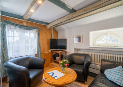 Wohnzimmer in der Ferienwohnung Haubarg F2 - Haubarg & Remise St. Peter-Ording