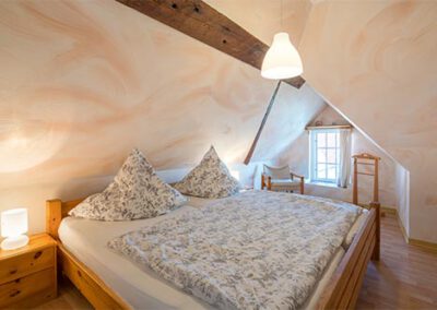 Schlafzimmer in der Ferienwohnung F5 Haubarg & Remise St. Peter-Ording